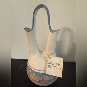 New West Pottery "The Wedding Vase is a unique piece of pottery depicting myth.
